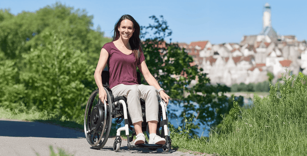 pushrim activated power assist, manual wheelchair power add-on