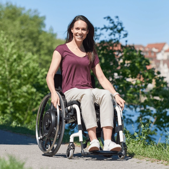 Servo-Pushrim Activated-The SERVO opens up the possibility for wheelchair users with limited strength to move around independently again and expand their personal radius of action.-Glide Products
