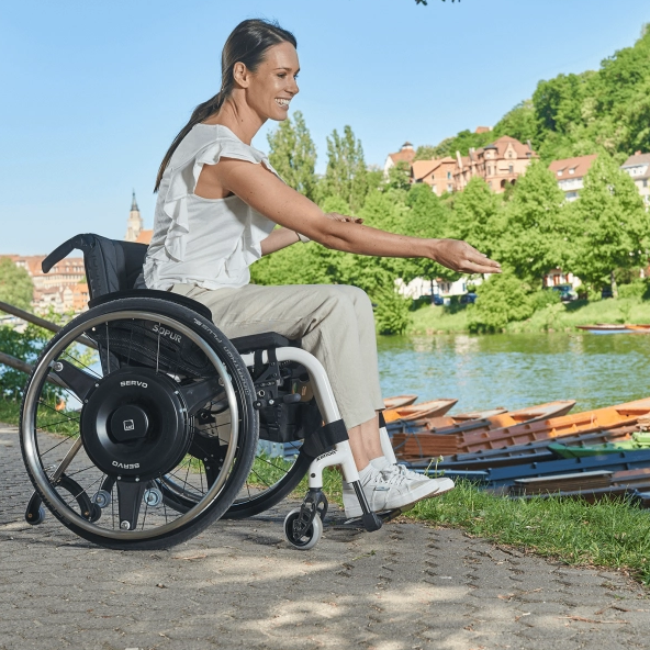 Servo-Pushrim Activated-The SERVO opens up the possibility for wheelchair users with limited strength to move around independently again and expand their personal radius of action.-Glide Products